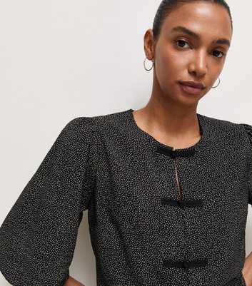 Black Spot Print Knot Front Blouse