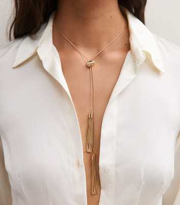 Gold Tone Long Tassel Ribbed Necklace