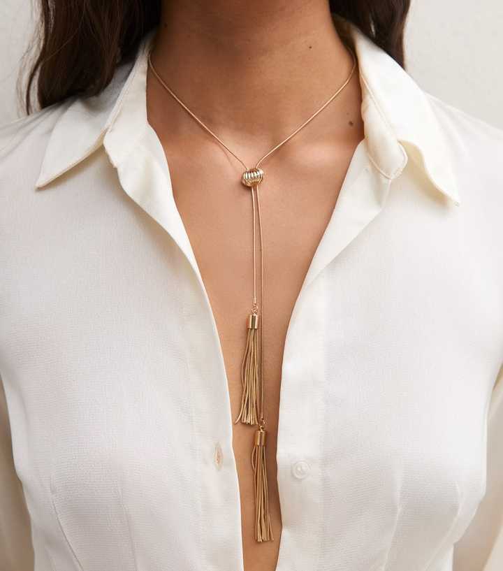 Gold Tone Long Tassel Ribbed Necklace