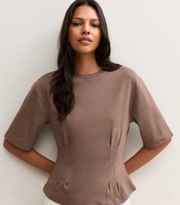 Mink Cotton Rich Peplum Hem Corset Waist Top