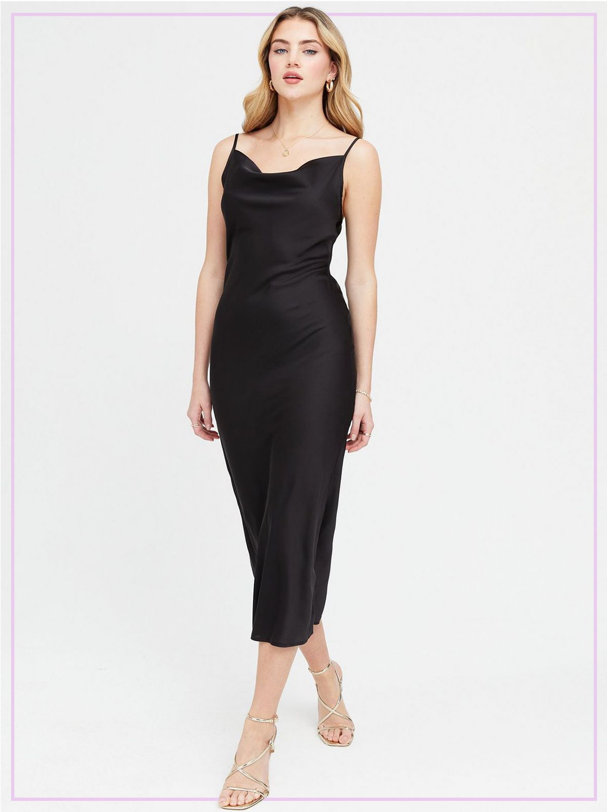 Woman Wearing a Black Satin Cowl Neck Midi Slip Dress and Gold Strappy Heels