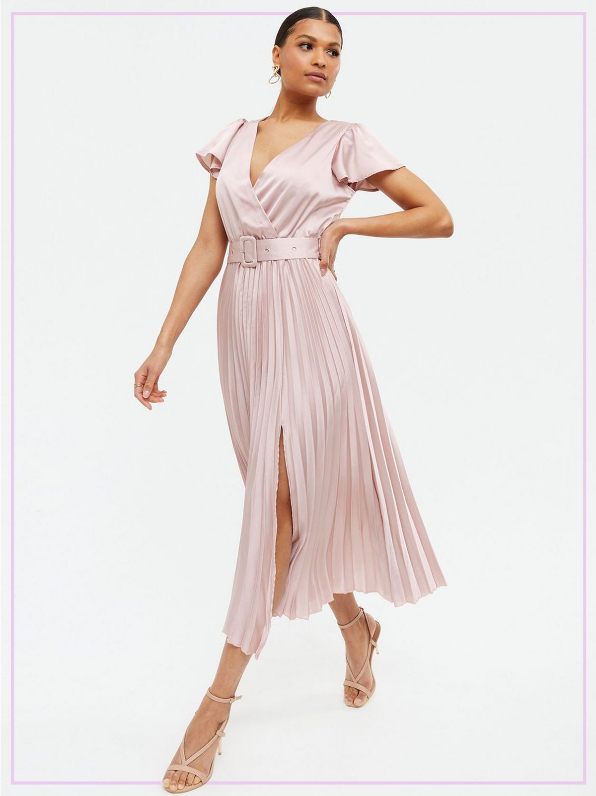 Woman Wearing a Pale Pink Satin Belted Pleated Wrap Midi Dress and Pink Heels
