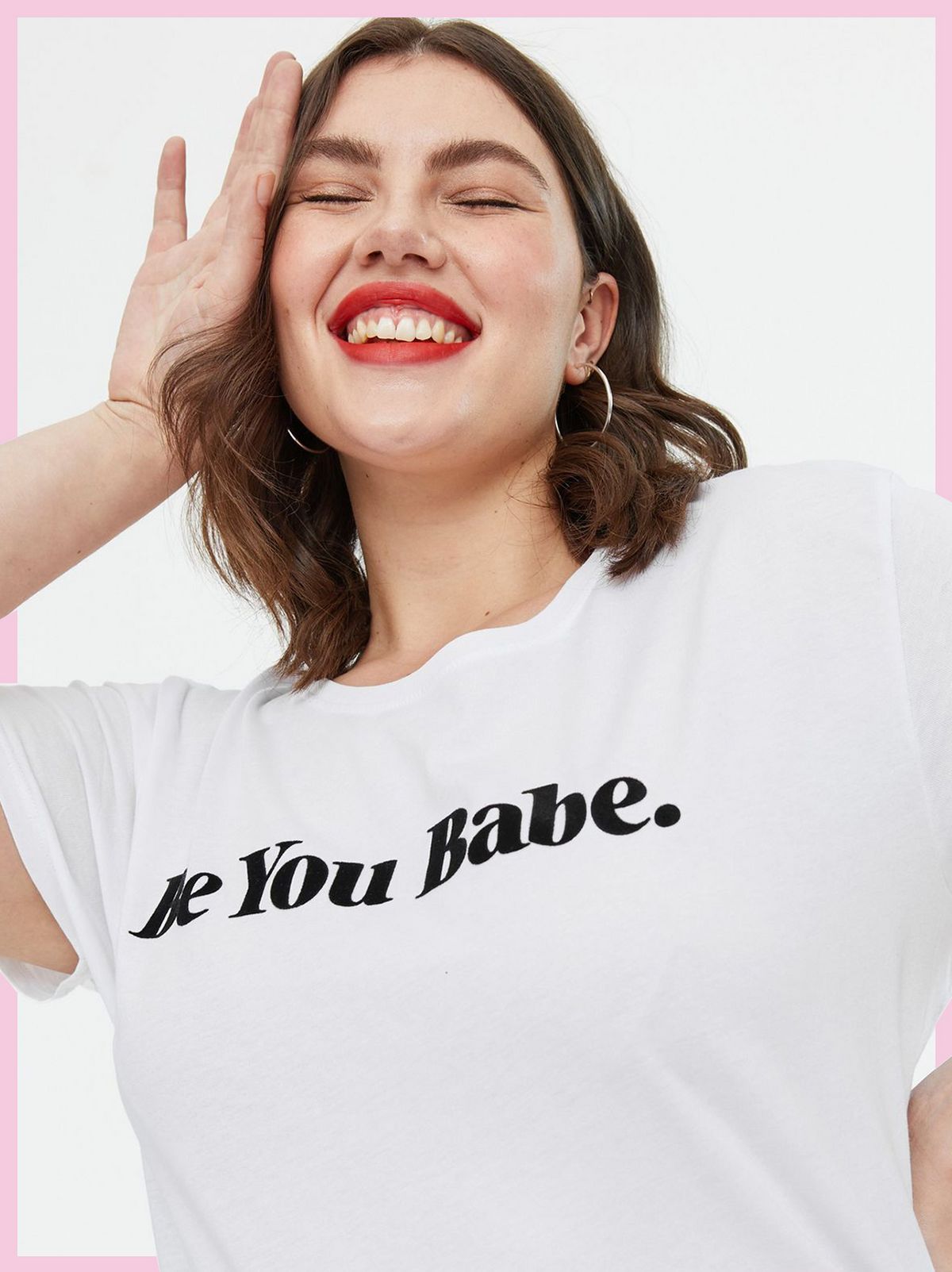 Woman wearing a White Be You Babe Logo T-Shirt