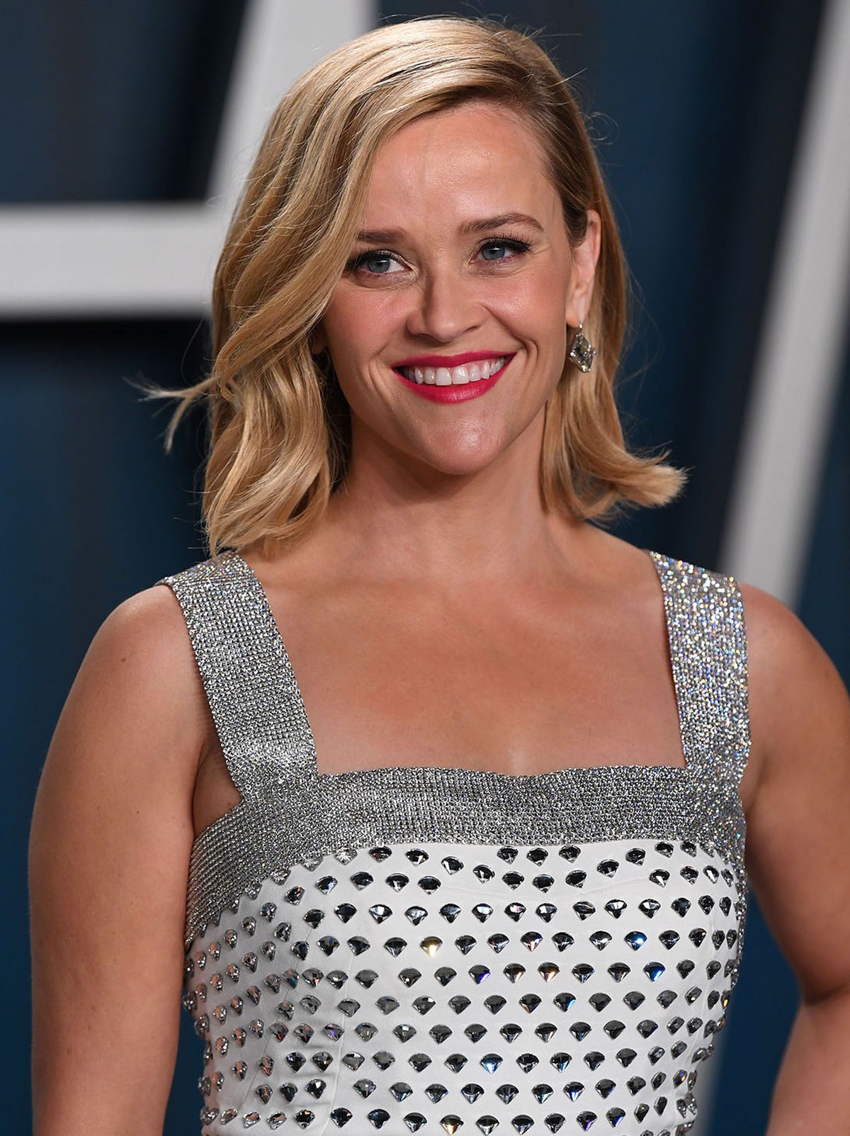 reese witherspoon wears silver dress